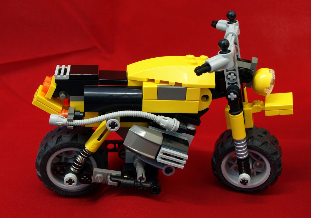 4404 Lego® Designer Set „Land Buster + Motorrad „